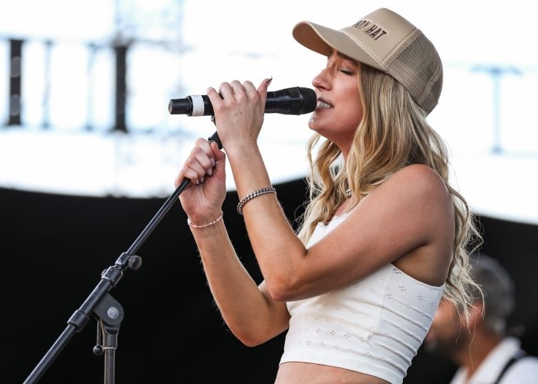 Singer Ingrid Andress says she was drunk during criticized MLB anthem performance, will get treatment | CBC News