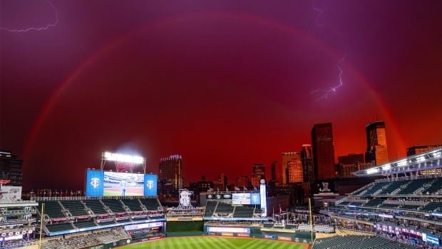 #TheMoment an MLB photographer captured rainbow lightning