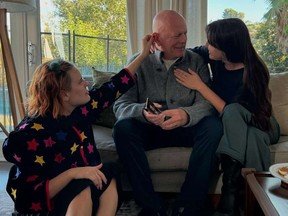 Bruce Willis seen celebrating Thanksgiving with daughters in rare pic